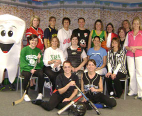 team dressed in sports costumes