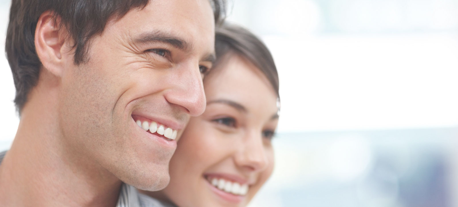 man and woman smiling