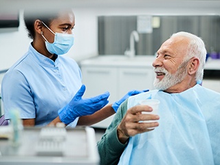 patient talking to dentist