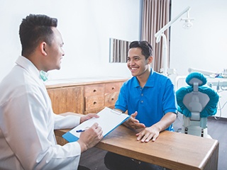 patient talking to dentist about financing cost 