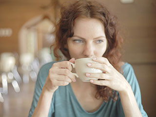 woman drinking coffee