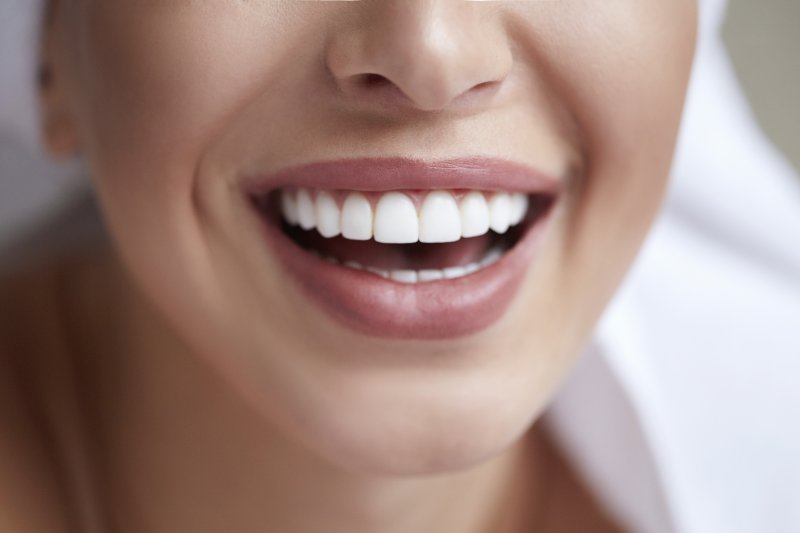 an up-close view of a person’s smile after seeing a cosmetic dentist in McComb